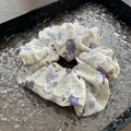 Detail of floral scrunchie with purple roses and delicate white lace trim on tray - Purple Beige Floral Lace Small