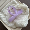 Elegant purple matte bow hair claw clip with strong metal spring on textured background - Purple