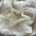 Dettaglio del fermaglio per capelli a stella bianco crema con molla in metallo oro - Bianco Piccolo