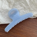 Detailed view of a light blue butterfly hair claw clip with a glossy translucent finish - Light Blue