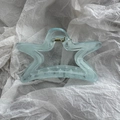 Detail of light blue translucent star hair claw clip with golden metal spring - Star Blue Two-tone Hair Clip