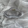 Detail view of large marble cloud hair claw clip with golden metal spring and wave design - Cloud Gray Two-tone Hair Clip