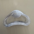 Macro detail of acrylic hair claw showing white marble texture and metal spring mechanism - Gray Flow Pattern