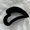 Close-up of black velvet heart-shaped hair claw clip with a matte vintage texture - Flocked Black