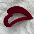 Detailed view of the burgundy velvet hair claw clip with its curved hollow design - Flocking Wine Red
