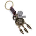 Vintage eagle pendant leather keychain with woven details and antique bronze finish - Brown