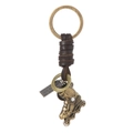 Llavero vintage de bronce con cuero y colgante detallado de mini patín de ruedas retro - Patín de hielo