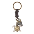 Llavero de tortuga vintage en bronce con correa de cuero trenzado y placa de metal grabada - Tortuga
