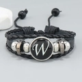 Detail of multi-layer braided leather bracelet with letter W charm and silver beads - Letter W