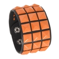 Punk black leather wristband with three rows of orange square pyramid studs and snaps - Orange