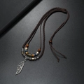 Vintage layered feather pendant necklace with dark brown cords and ethnic beads - Long Leaf Coffee Rope