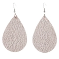 Macro detail of teardrop faux leather earrings with champagne gold litchi texture - Gold