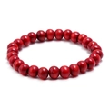 Close-up of ethnic red beaded bracelet featuring round wooden beads and elastic cord - Saturated Red Round Bead Style (HM-F0009-K)