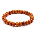 Detailed macro view of polished round wooden beads with natural grain on elastic bracelet - Brownish Red Natural Grain Style (HM-F0009-I)