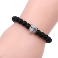 Macro detail of men's matte black bead bracelet featuring a silver zircon leopard head - Silver Leopard Head Style / White K/Silver