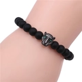 Close-up of black matte bead bracelet featuring a leopard head encrusted with white zircons - Black Leopard Head Style / Black