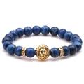 Blue volcanic stone beaded bracelet with golden lion head charm and sparkly spacers - Blue