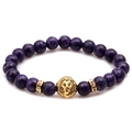 Purple volcanic stone beaded bracelet featuring a detailed golden lion head ornament - Purple
