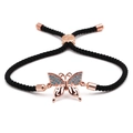 Verstellbares schwarzes Seilarmband mit Roségold Schmetterling und blauen Steinen - Roségold