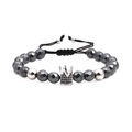 Faceted hematite beaded bracelet featuring a silver crown charm with black cubic zirconia - White Gold