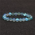 Bracelet à une rangée de perles de lune avec éclat bleu aurora sur perles de verre - Bleu clair