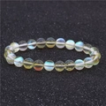 Bracelet en perles de pierre de lune aux reflets bleus avec cordon élastique transparent - Light jaune