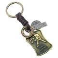 Porte-clés signe Balance vintage avec cuir tressé marron et pendentif en alliage de bronze - Balance