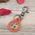 Retro oranje lederen sleutelhanger met kruishanger en metalen karabijnsluiting - Tan