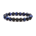 Blue tiger eye beaded bracelet with 10mm volcanic lava stone accents on white background - Blue Tiger Eye And Lava Stone