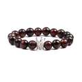 10mm Red Tiger Eye beaded bracelet featuring a micro-pave zircon crown charm on white background - Tiger's Eye