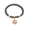 Bracciale natalizio in perline di ematite con ciondolo a fiocco di neve dorato e cristalli - Fiocco di Neve Dorato