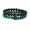 Dettaglio del set di bracciali con corona pietre laviche nere e perle fenice blu - Corona Gun Black Pietra Lavica