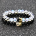 Ensemble de bracelets en perles couronne pierre de lune et volcanique sur fond noir - Bracelets Agate Noire Et Pierre De Lune / Bracelets Agate Noire Et Pierre De Lune
