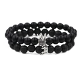 Set de dos pulseras de corona con cuentas negras mates y piedras de lava para parejas - Plateado