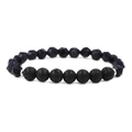 Dettaglio delle pietre sfaccettate e delle perle di lava porosa su un bracciale di perline - Pietra di sabbia blu