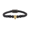 Men's black woven leather bracelet with matte beads and gold skull charm on white background - Golden Ghost Head