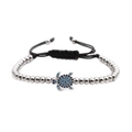 Silver bead bracelet featuring a zircon-encrusted turtle charm with blue gradient stones - White Gold