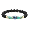 Yin Yang Lava Armband aus schwarzem Lavastein und grün gepunkteten Natursteinperlen - Schwarzer Lavastein Stil