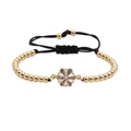 Lussuoso bracciale di perline dorate con ciondolo a fiore esagonale e zirconi colorati - Oro