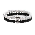 Close-up of matte black and white marble stone bracelets with Tai Chi Yin Yang symbols - White Turquoise