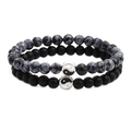 Detail of double-layer beaded bracelet set featuring obsidian and matte onyx with yin yang charms - Map Stone
