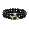 Double-layered black onyx bead bracelet featuring a gold wolf head and crown with green stones - Gold Wolf Head and Crown Combination
