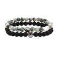 Close-up of lava rock and green moss agate bead bracelets with yin yang charms - Grass Green Stone and Lava Stone