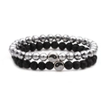 Detail view of two-piece beaded Yin Yang bracelets with lava stone and silver hematite beads - Hematite and Lava Stone