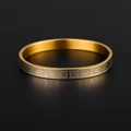 Detailed close-up of two-tone gold and silver titanium steel ring with geometric pattern - Gold