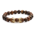Bracelet en perles d'oeil de tigre avec accents de couronne dorée et style lion vintage - Couronne Oeil de Tigre Unique