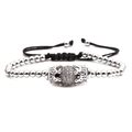 Pulsera de cuentas plateadas con bola de circón de 10mm y coronas en cordón negro - Platino