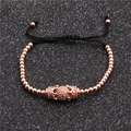 Pulsera de oro rosa con cuentas de circonita micro-pavé y cordón negro ajustable - Oro rosa