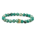 Detailed close-up of 8mm marble texture stone beads with a golden crown charm bracelet - Green Imperial Stone With Gold Crown