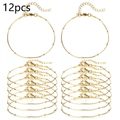 Detail showing 12pcs golden beaded chains with lobster clasp and extension links - Gold